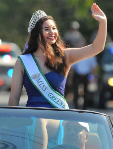 2016 Miss Greenbelt, Julia Sharapi, greets parade crowds.  Photo by Sharon Natoli