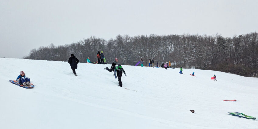 Snow Blankets Greenbelt, Causes Closures, Brings Out Shovels, Sleds